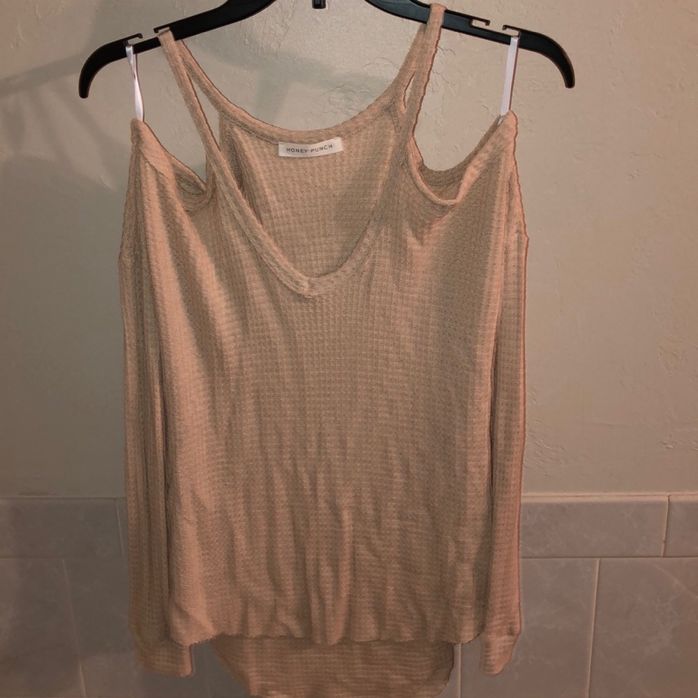 Small Honey punch off the shoulder with sleeves.